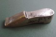 Shoe shaped match holder striker