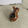 Brown rabbit majolica statue. Image 4