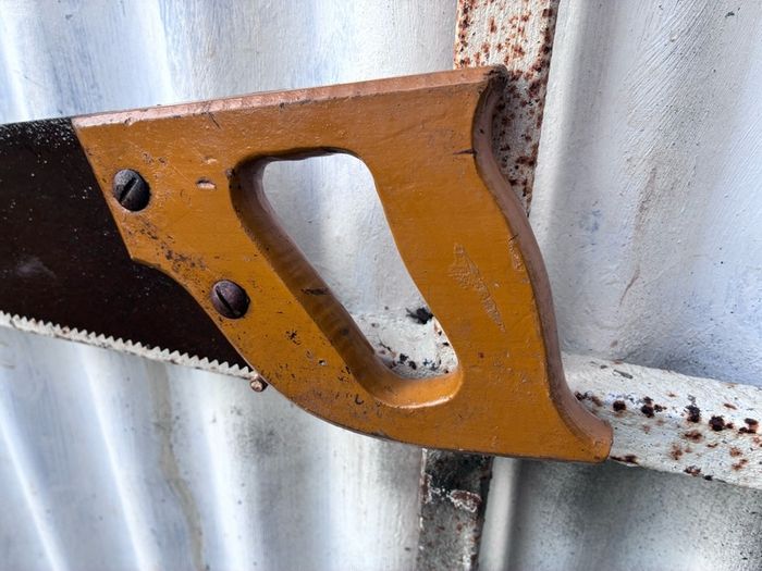 vintage wooden handled carpenters saw