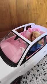 Barbie with car.