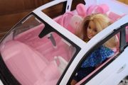 Barbie with car.