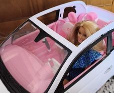 Barbie with car.