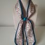 Paisley print neck scarf with teal ring detail Image 2