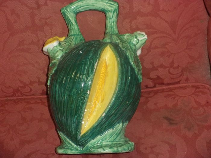 antiques majolia water jug in the shape of a mellan