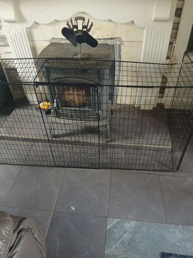 solid fuel stove heat blower and childproof fence