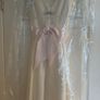 Marks and Spencer ivory dress with pink bow Image 5