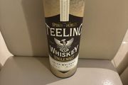 Empty Teelings Irish whiskey tube (no bottle)