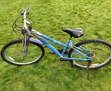 Light blue kids mtb bike in need of some TLC