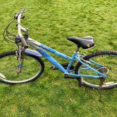 Light blue kids mtb bike in need of some TLC