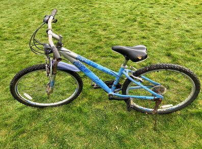 Light blue kids mtb bike in need of some TLC