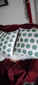 Cushions  4 large featherfilled. Zipper outers
