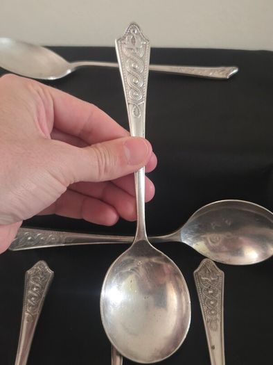 Collection of 11 Vintage Newbridge Silverware Celtic Dragon Design Spoons from Jurys Hotel