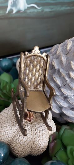 Vintage brass rocking chair