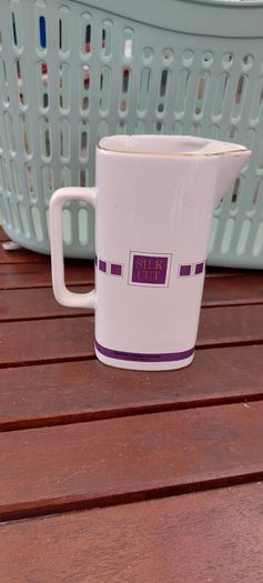 Silk Cut Purple advertising, water jug ,collectors item,,little chip on rim overall good,see pictures for condition, collectors item,,sold as seen