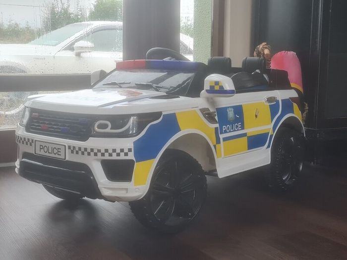 electric ride on police car