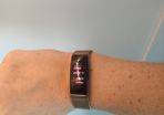 Fitbit inspire 2watch with gold strap and charger