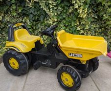 JCB with front tipper with 1trailer and round bales, and toddler John Deere tractor