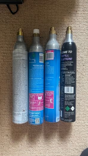 Empty soda stream canisters