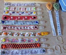 14 Soother clips Holders & 3 Longer ones. 17 total