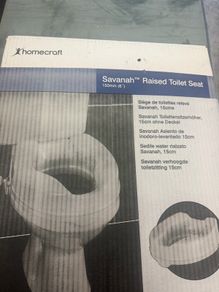 Raised toilet seat
