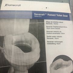 Raised toilet seat
