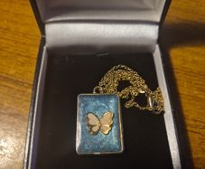 White Butterfly Necklace in Blue Background and Golden Frame