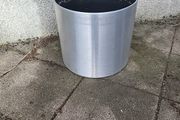 Brushed aluminium plant pot