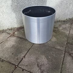 Brushed aluminium plant pot