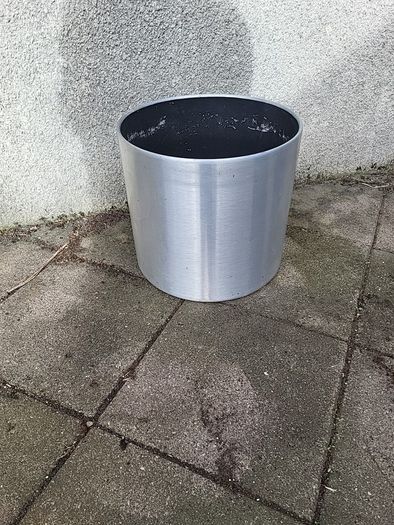 Brushed aluminium plant pot