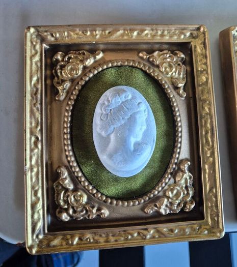 A pair of MidCentury Kelgin wall hanging Plaster  Vintage decorative pair of wall plaques featuring plaster cameos on green velvet background with ornate gold relief plaster frames