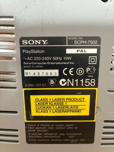 PlayStation console, Dual Shock controller, and all cables