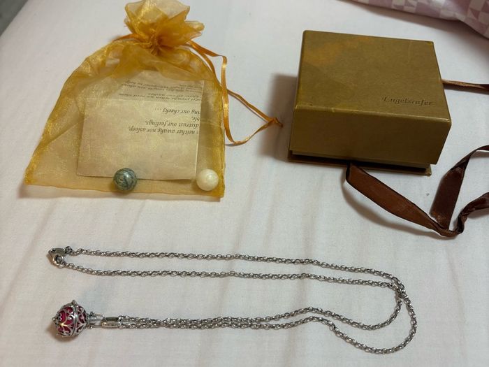 angel whisperer pendant