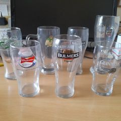 JOB LOT of 7 stamped pint glasses