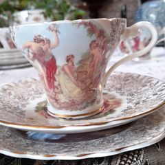 An antique  Aynsley tea trio