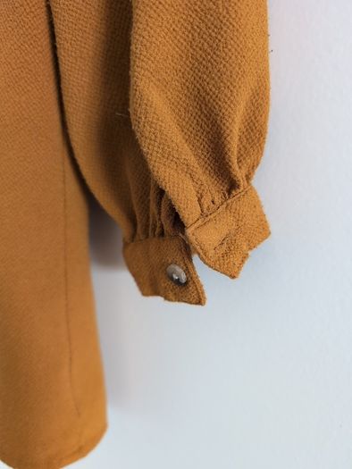 All About You mustard yellow top