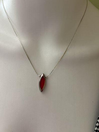 Delicate silver tone chain necklace with red pendant