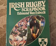 This 1982 first edition copy of "Irish Rugby Scrapbook" by Edmund Van Esbeck. Large volume paperback in good condition.  This 1982 first edition copy of "Irish Rugby Scrapbook" by Edmund Van Esbeck photos for same.