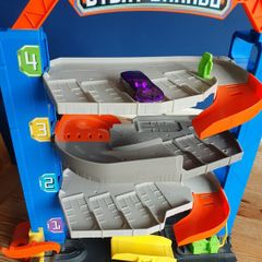 Small cars, garage, road carpet and a truck