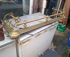A Beautiful Antique Brass Fireplace Fender with awesome Scroll Brass on the Sides