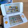 Nintendo 2DS XL Orange with 20 games Image 2