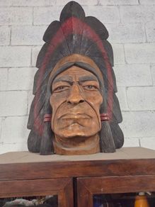 large wooden carved indian chief