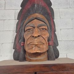 large wooden carved indian chief