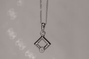 Sterling silver square pendant with a cz stone