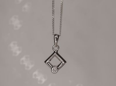 Sterling silver square pendant with a cz stone