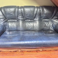 leather sofa and armchairs
