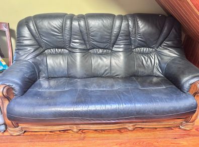 leather sofa and armchairs