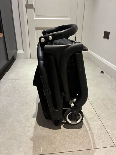 Bugaboo Butterfly with rain cover, standing board