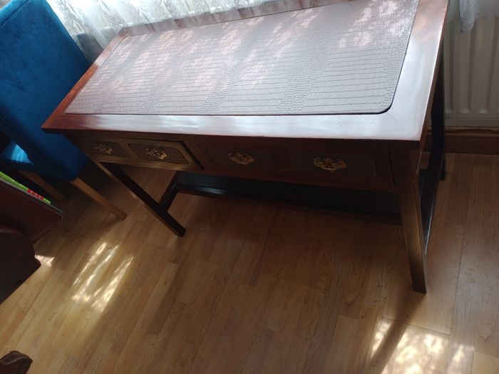 Wooden console table with faux crocodile skin detail