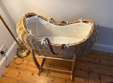 Beautiful straw Moses basket with Clair de lune rocker and two Clair de lune covers