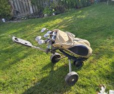 Ladies golf clubs, bag and caddy car